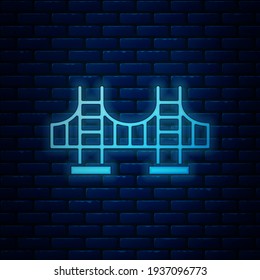 Glowing neon Golden gate bridge icon isolated on brick wall background. San Francisco California United States of America.  Vector