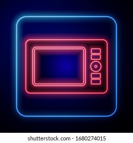 Glowing neon Graphic tablet icon isolated on blue background.  Vector Illustration