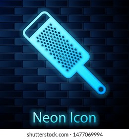 Glowing neon Grater icon isolated on brick wall background. Kitchen symbol. Cooking utensil. Cutlery sign.  Vector Illustration