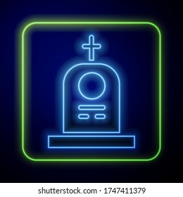Glowing neon Grave with tombstone icon isolated on blue background.  Vector