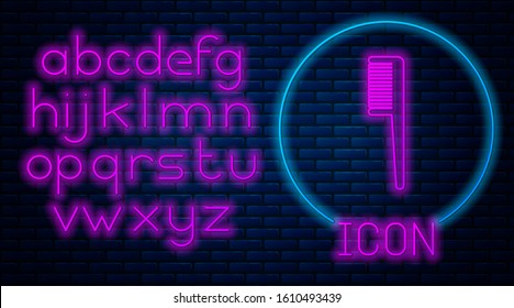 Glowing neon Hairbrush icon isolated on brick wall background. Comb hair sign. Barber symbol. Neon light alphabet. Vector Illustration