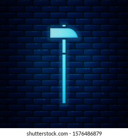 Glowing neon Hammer icon isolated on brick wall background. Tool for repair.  Vector Illustration