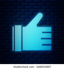 Glowing neon Hand like icon isolated on brick wall background.  Vector Illustration