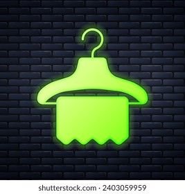 Glowing neon Hanger wardrobe icon isolated on brick wall background. Cloakroom icon. Clothes service symbol. Laundry hanger sign.  Vector