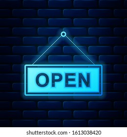 Glowing neon Hanging sign with text Open door icon isolated on brick wall background.  Vector Illustration