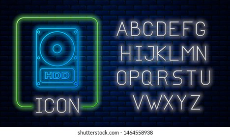 Glowing neon Hard disk drive HDD icon isolated on brick wall background. Neon light alphabet. Vector Illustration