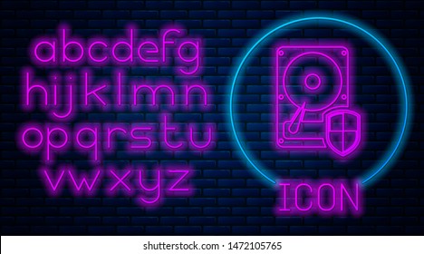 Glowing neon Hard disk drive HDD protection icon isolated on brick wall background. Neon light alphabet. Vector Illustration