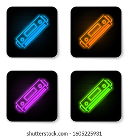 Glowing neon Harmonica icon isolated on white background. Musical instrument. Black square button. Vector Illustration