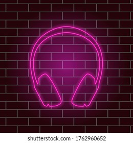 Glowing neon headphones. Pink light. Linear sign. Vector illustration.