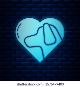 Glowing neon Heart with dog icon isolated on brick wall background. Pet paw in heart. Love to the animals.  Vector Illustration