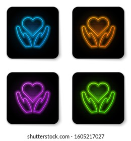 Glowing neon Heart on hand icon isolated on white background. Hand giving love symbol. Valentines day symbol. Black square button. Vector Illustration