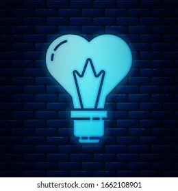 Glowing neon Heart shape in a light bulb icon isolated on brick wall background. Love symbol. 8 March. International Happy Women Day.  Vector Illustration