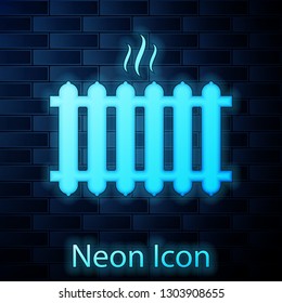 Glowing neon Heating radiator icon isolated on brick wall background. Vector Illustration