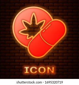 Glowing neon Herbal ecstasy tablets icon isolated on brick wall background. Vector Illustration