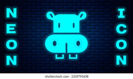 Glowing neon Hippo or Hippopotamus icon isolated on brick wall background. Animal symbol.  Vector