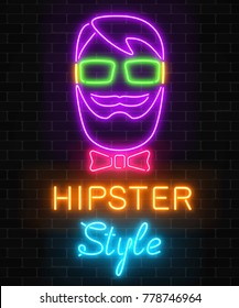 Glowing neon hipster man sign with lettering and dark wall brick background. Man with beard, glasses and bow tie bright icon. Vector illustration.