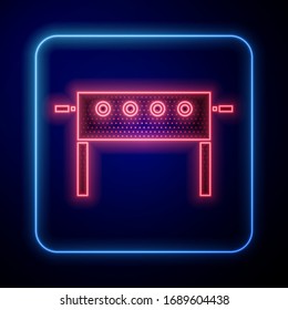 Glowing neon Hockey table icon isolated on blue background.  Vector Illustration