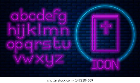 Glowing neon Holy bible book icon isolated on brick wall background. Neon light alphabet. Vector Illustration