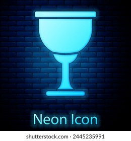 Glowing neon Holy grail or chalice icon isolated on brick wall background. Christian chalice. Christianity icon.  Vector