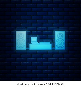 Glowing neon Home stereo with two speaker s icon isolated on brick wall background. Music system.  Vector Illustration