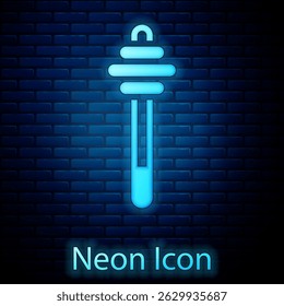 Glowing neon Honey dipper stick icon isolated on brick wall background. Honey ladle.  Vector