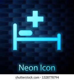 Glowing neon Hospital Bed with Medical symbol of the Emergency - Star of Life icon isolated on brick wall background. Vector Illustration