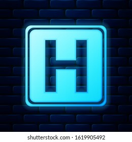 Glowing Neon Hospital Sign Icon Isolated On Brick Wall Background.  Vector Illustration