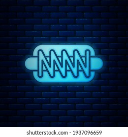 Glowing neon Hotdog sandwich icon isolated on brick wall background. Sausage icon. Fast food sign.  Vector