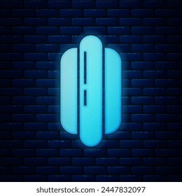 Glowing neon Hotdog sandwich icon isolated on brick wall background. Sausage icon. Fast food sign.  Vector