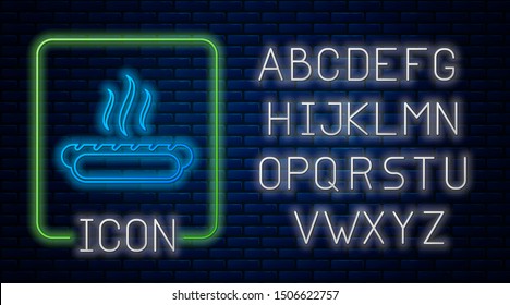 Glowing neon Hotdog sandwich with mustard icon isolated on brick wall background. Sausage icon. Fast food sign. Neon light alphabet. Vector Illustration