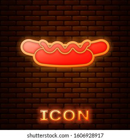 Glowing neon Hotdog sandwich with mustard icon isolated on brick wall background. Sausage icon. Street fast food menu.  Vector Illustration