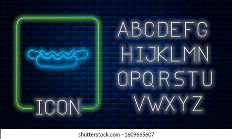 Glowing neon Hotdog sandwich with mustard icon isolated on brick wall background. Sausage icon. Street fast food menu. Neon light alphabet. Vector Illustration