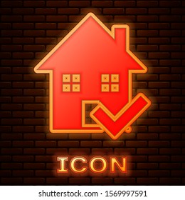 Glowing neon House with check mark icon isolated on brick wall background. Real estate agency or cottage town elite class.  Vector Illustration