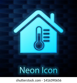 Glowing neon House temperature icon isolated on brick wall background. Thermometer icon. Vector Illustration