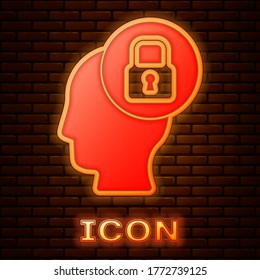 Glowing neon Human head with lock icon isolated on brick wall background. Vector