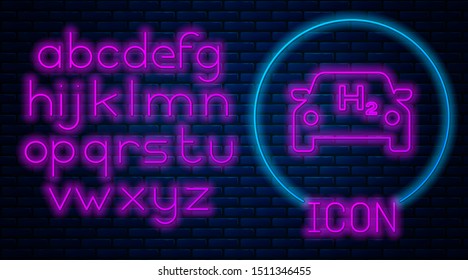 Glowing neon Hydrogen car icon isolated on brick wall background. H2 station sign. Hydrogen fuel cell car eco environment friendly zero emission. Neon light alphabet. Vector Illustration