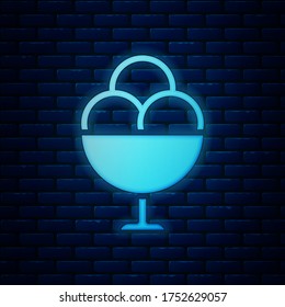 Glowing neon Ice cream in the bowl icon isolated on brick wall background. Sweet symbol.  Vector