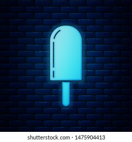 Glowing neon Ice cream icon isolated on brick wall background. Sweet symbol.  Vector Illustration