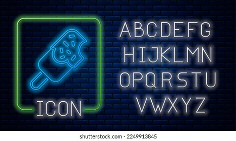 Glowing neon Ice cream icon isolated on brick wall background. Sweet symbol. Neon light alphabet. Vector
