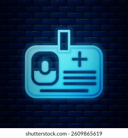 Glowing neon Identification badge icon isolated on brick wall background. It can be used for presentation, identity of the company, advertising.  Vector