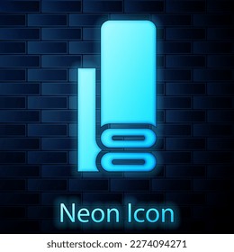 Glowing neon Indian textile fabric icon isolated on brick wall background. Roll, mat, rug, cloth, carpet or paper roll icon.  Vector