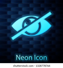 Glowing neon Invisible or hide icon isolated on brick wall background. Vector Illustration