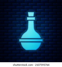 Glowing neon Jewish wine bottle icon isolated on brick wall background.  Vector