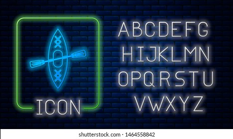 Glowing neon Kayak and paddle icon isolated on brick wall background. Kayak and canoe for fishing and tourism. Outdoor activities. Neon light alphabet. Vector Illustration