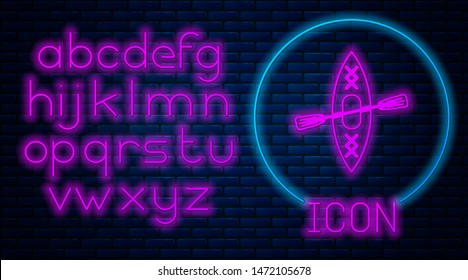 Glowing neon Kayak and paddle icon isolated on brick wall background. Kayak and canoe for fishing and tourism. Outdoor activities. Neon light alphabet. Vector Illustration