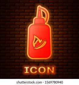 Glowing neon Ketchup bottle icon isolated on brick wall background. Fire flame icon. Hot chili pepper pod sign. Barbecue and BBQ grill symbol.  Vector Illustration