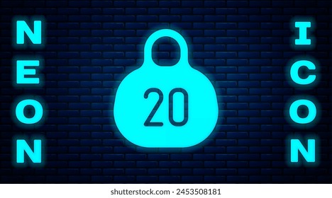 Leuchtendes Neon Kettlebell-Symbol isoliert auf Backsteinwand Hintergrund. Sportgeräte.  Vektorgrafik