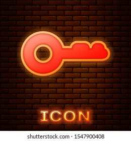 Glowing neon Key icon isolated on brick wall background.  Vector Illustration