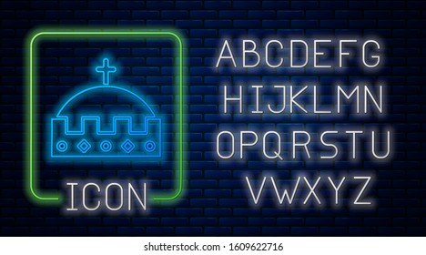 Glowing neon King crown icon isolated on brick wall background. Neon light alphabet. Vector Illustration