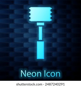 Glowing neon Kitchen hammer icon isolated on brick wall background. Meat hammer.  Vector